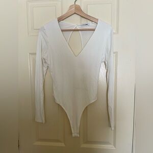 Fashion Nova cream cutout bodysuit M